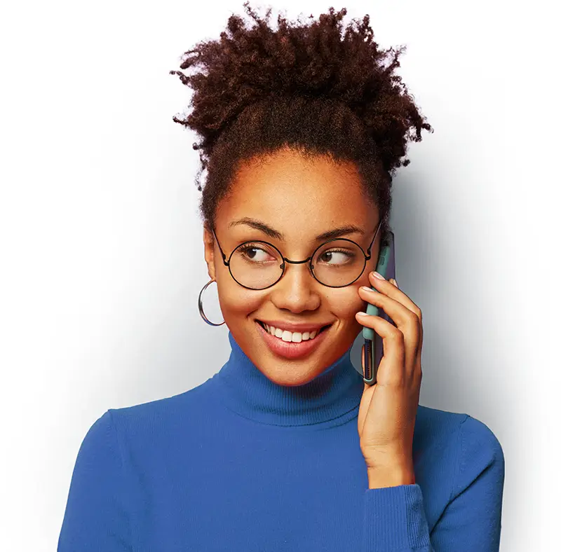 Smiling woman using a cell phone